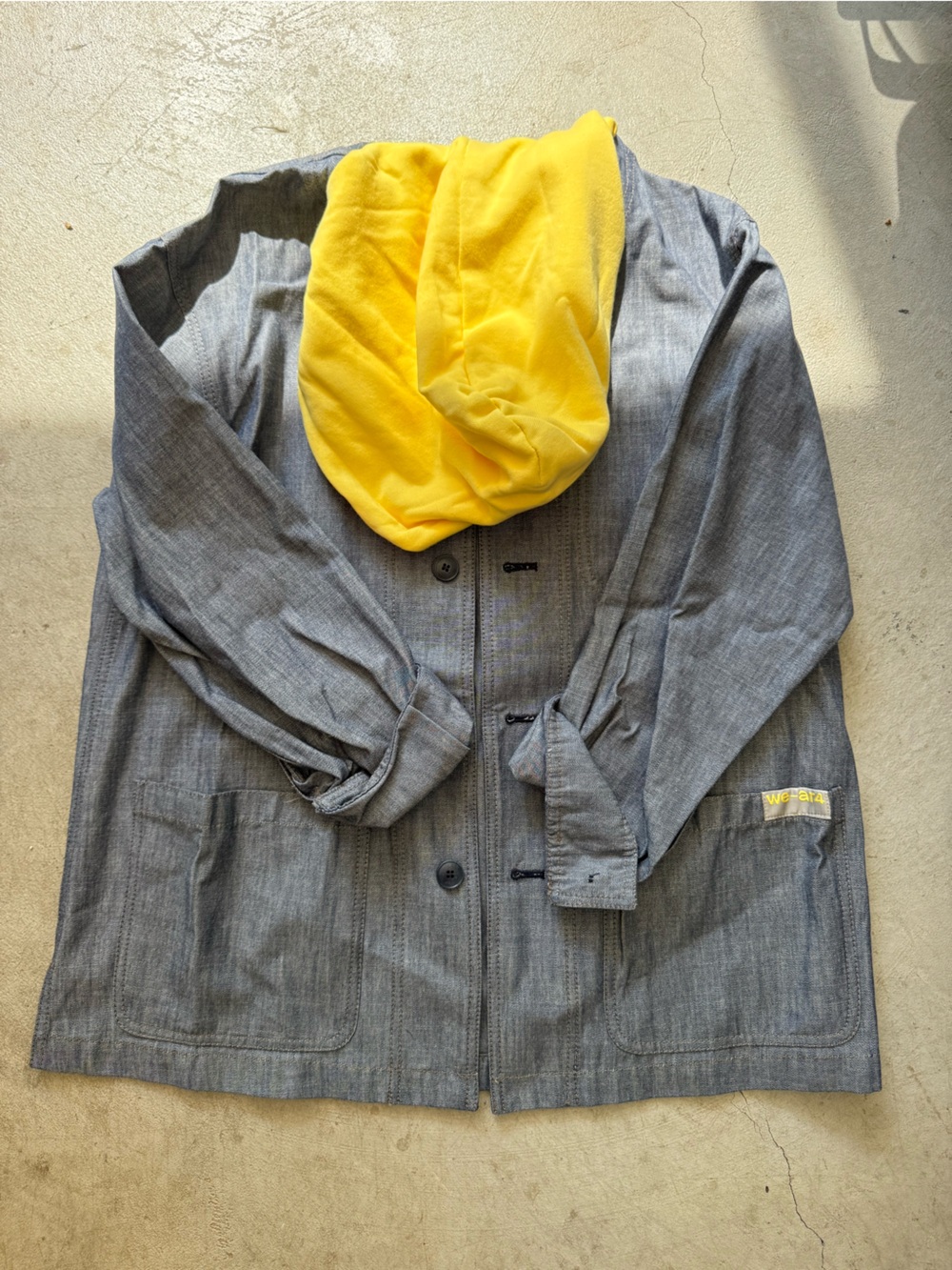 Gray Button-Up Jacket with Bright Yellow Hood